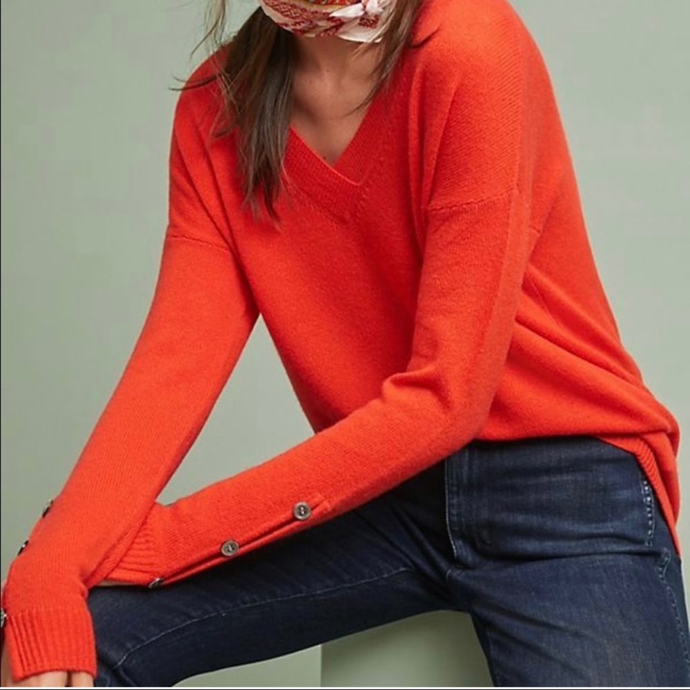 Charli tangerine cashmere sweater.